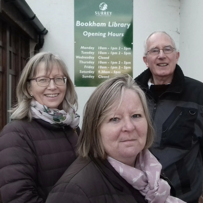 Bookham South Councillor Elizabeth Daly (centre, seen with campaigners Nancy Goodacre and Roger Adams) is determined to prevent the closure of Bookham Library and reverse previous cuts. She says: "We need to send a clear message to the Tories."