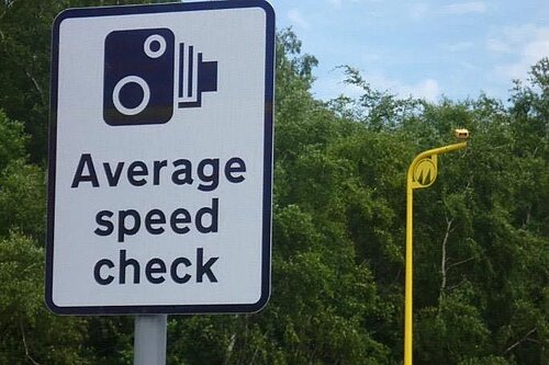 Sign saying 'Average speed check'